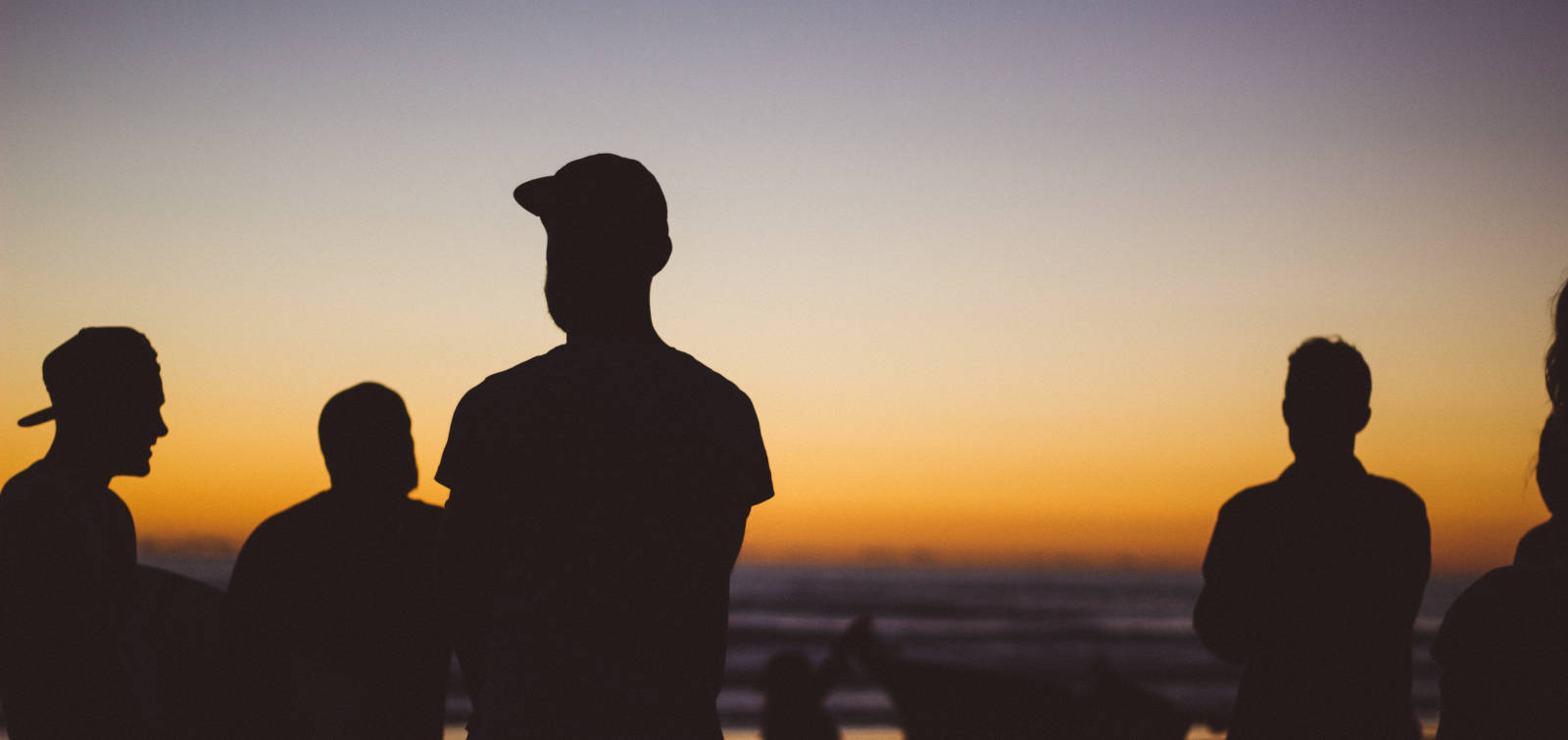 men watching the sunset